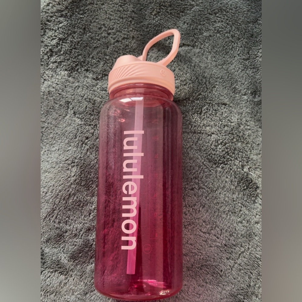 pink Lululemon water bottle small hard water stains